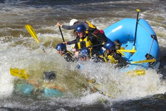 a raft next to a body of water