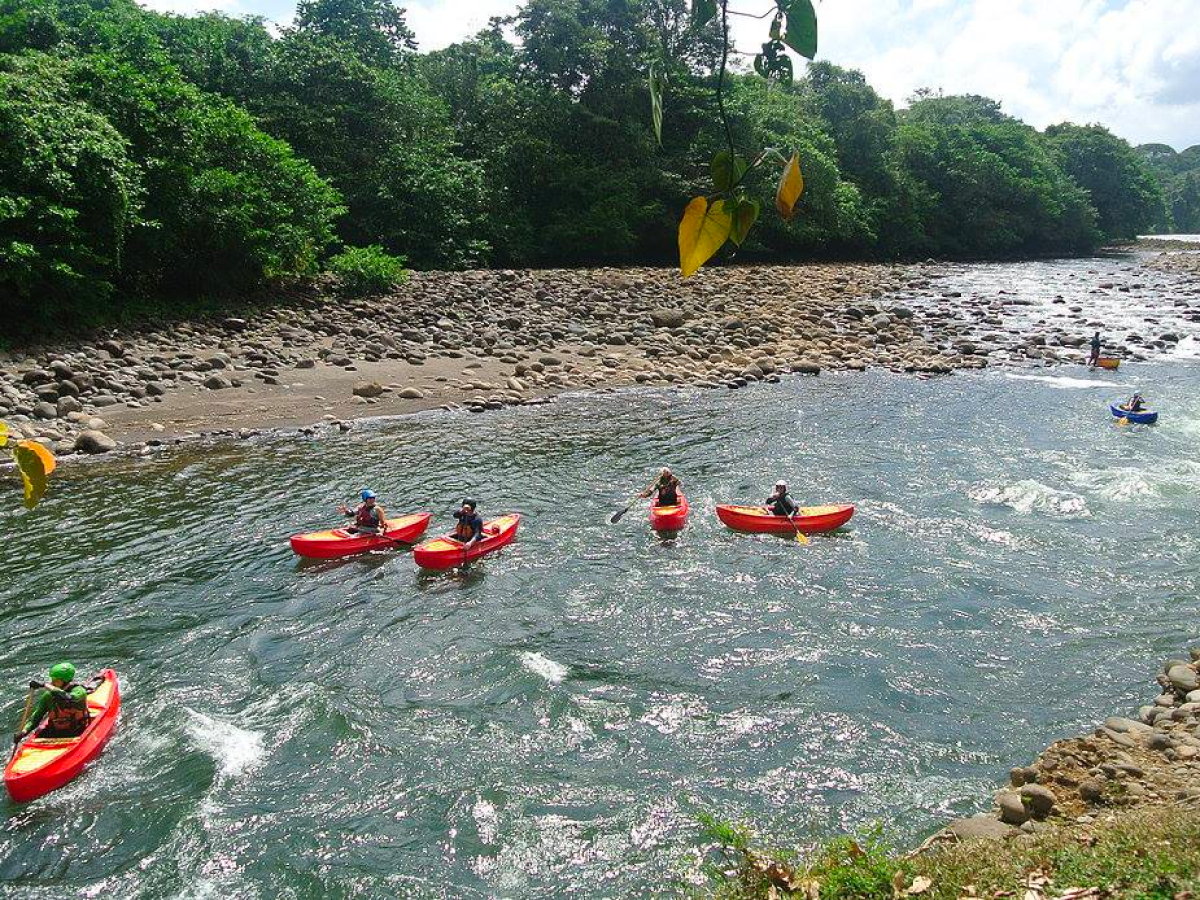 a group of people on a raft