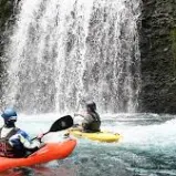 a man riding a jet ski in the water