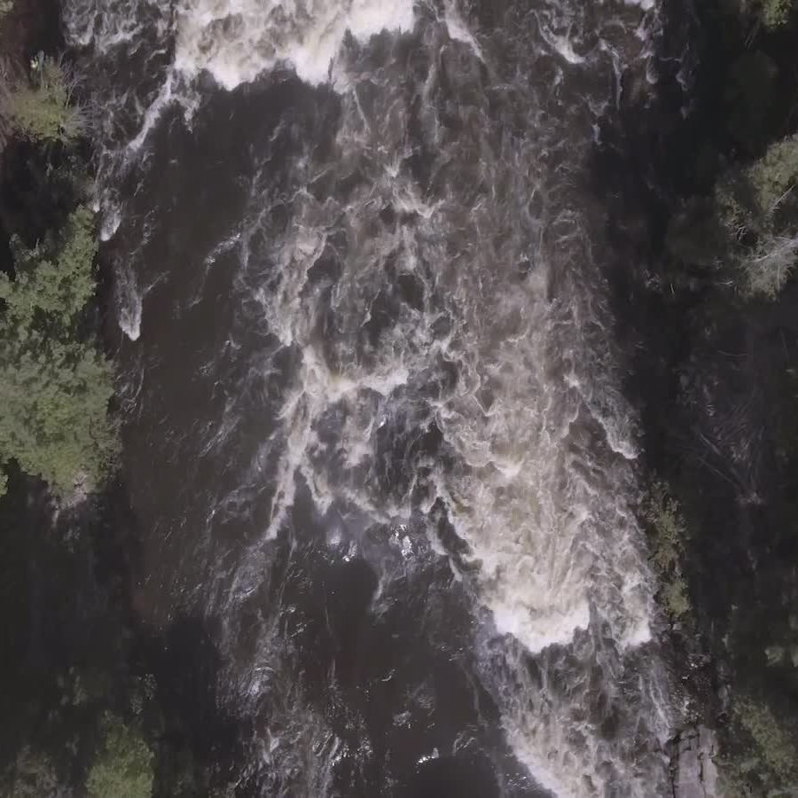 a waterfall in the background